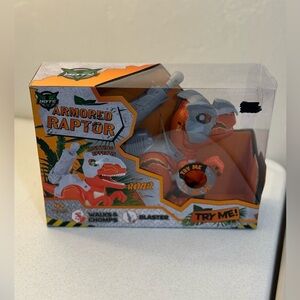 Orange and Gray Blaster Toy with Reptile Design